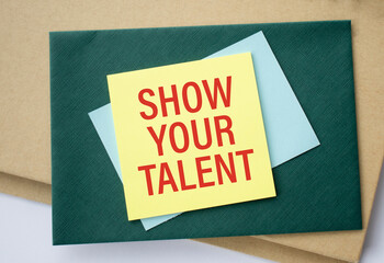 Show your talent written on color sticky notes over white background.