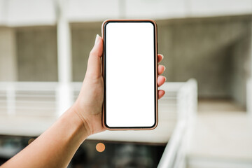 Women's hands holding cell telephone blank copy space screen. smart phone with technology concept