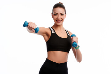 Attractive caucasian slim woman doing physical exercise using dumbbell isolated on white background
