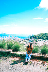 Fototapeta premium Asian woman Travelling tour happy in vacation summer in nature forest.