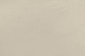 Beige homogeneous background with a textured surface
