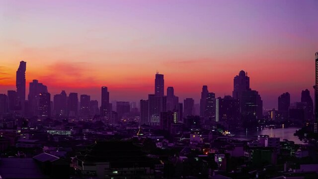 Sunrise Time lapse of bangkok city on Chao Phraya River , Thailand  Take photo from Yaowarach Chinatown.