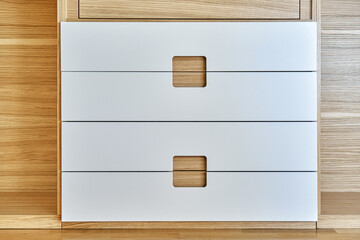 Modern wardrobe with finger pull design. Wooden wardrobe with light gray cabinet doors. Modern furniture