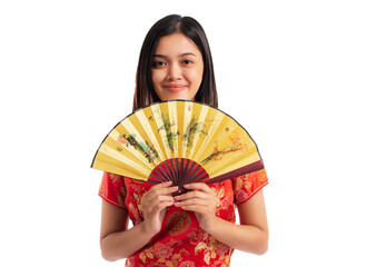 Obraz premium Chinese girl in traditional dress holding a fan isolated on white background