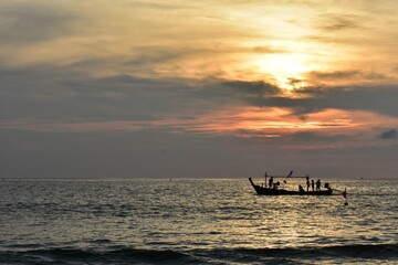 Fototapeta na wymiar boat at sunset phuket island thailand