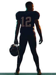 one afro american football player man in studio silhouette shadow isolated on white background © snaptitude