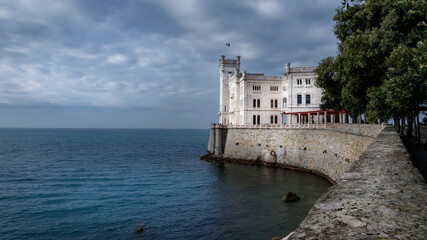 Fototapeta na wymiar Italian castle by Adriatic sea in the gulf of Triest, ocean view in day light