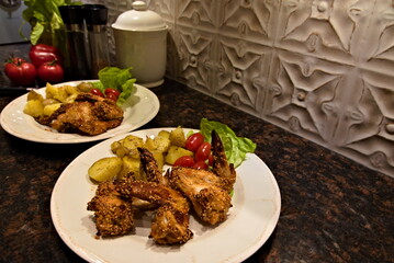 Chicken wings in sesame coating.