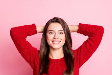 Obraz na płótnie Canvas Photo of young cute lady hands behind head look camera white smile wear red sweater isolated pink color background