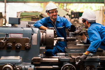Engineers and skilled technicians are maintaining machinery. Engineers are working and repairing...