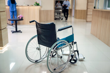 Empty wheelchair on corridor in the hospital