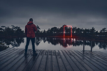 alone man and red fluorescent neon laser lights