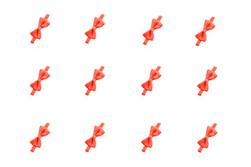 red bow pattern. red bow on a white background. ribbon
