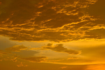 Majestic golden sky at sunset. Abstract nature background