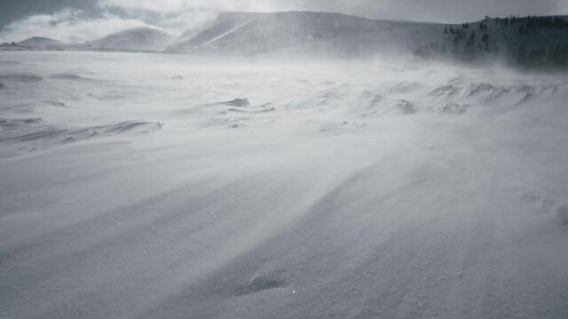 Snow storm mountains strong wind winter arctic weather