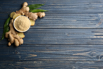 Dry ginger powder, fresh root and leaves on wooden table, flat lay. Space for text