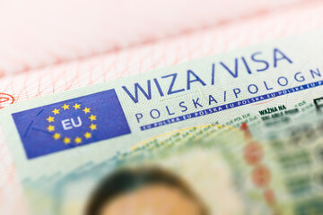 Polish visa in a passport close-up.