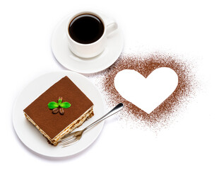 Traditional Italian Tiramisu square dessert portion on ceramic plate, cup of fresh hot espresso coffee and heart shape made of cocoa powder isolated on white