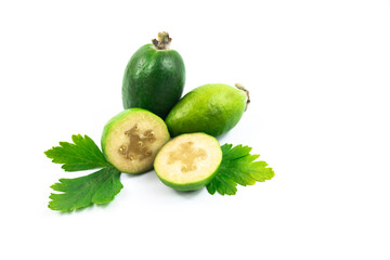 Tropical feijoa or acca sellowiana, pineapple guava fruit ripe and cut on white isolated background banner with greens