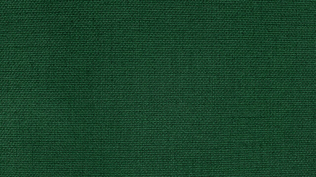 green linen fabric texture background ,green color scheme for christmas concept background.