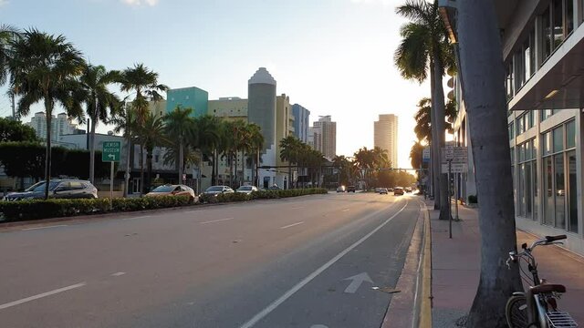 Landscape view of street of Miami. Colorful buildings on blue sky with white clouds background.  USA. Miami South Beach.