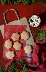red biscuit gift wooden background new year cup coffee