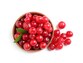 Fresh ripe cranberries with leaves on white background, top view