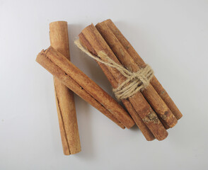 cinnamon sticks on white background
