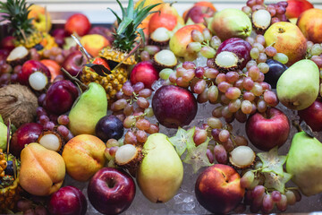 Beautifully decorated catering banquet table with variety of vegetables and different vegan vegetarian snacks on corporate christmas birthday party event or wedding celebration