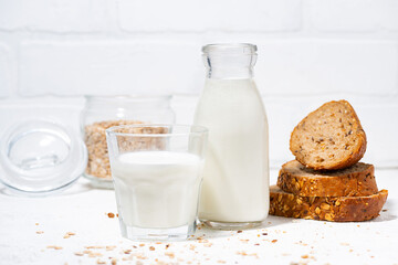 fresh milk and whole grain bread slices