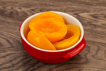 Marinated peaches fruit in the bowl