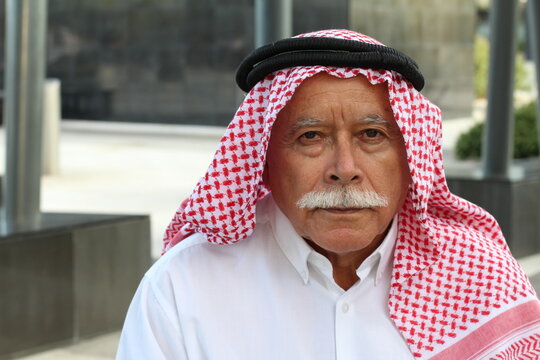 Arabic grandfather wearing a turban
