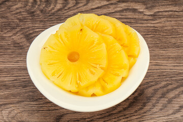 Marinated pineapple rings in the bowl