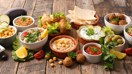 assortment of dish- hummus, falafel, pita bread, chickpea