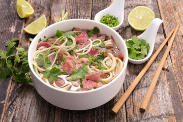 beef soup and noodles