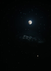 Fototapeta na wymiar Moon in the starry night sky
