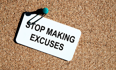 On the card attached to the comments board, the text STOP MAKING EXCUSES.