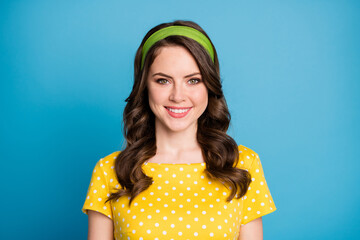 Photo of nice sweet young lady toothy smiling into camera isolated over blue color background