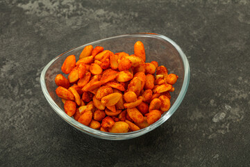 Chili peanut snack in the bowl