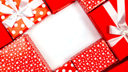 Frame made of gift boxes on white background, Christmas Concepts, New year concepts, top view, copy space. Autumn composition.