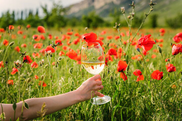 Large glass in the poppy field