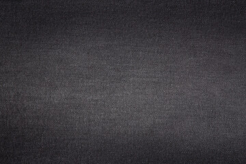 Black and blue denim background. Jeans texture.