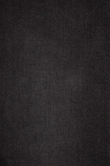 Black and blue denim background. Jeans texture.