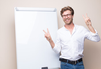 adult blonde businessman with a board