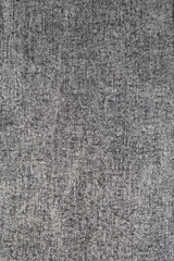 Black and blue denim background. Jeans texture.