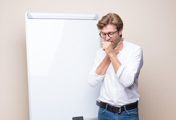 adult blonde businessman with a board