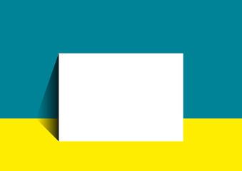 Eine weiße Fläche lehnt an einer farbigen Wand und steht auf farbigem Untergrund. Ein Mock-Up für ein DIN-Format im Querformat. Für Präsentationen oder als Raum für ein Design.