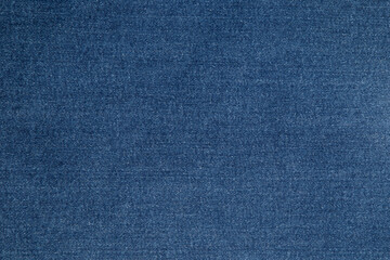 Blue background, denim jeans background. Jeans texture, fabric. Texture Jeans. Close Up Of Blue Jeans Fabric Macro With External Seams Yellow