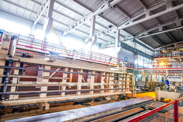 automated industrial equipment at the factory in production hall