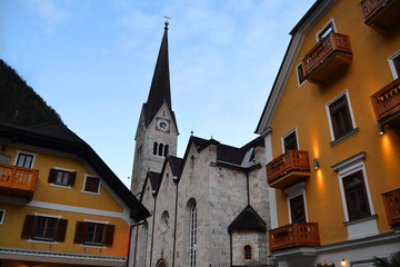 Fototapeta na wymiar Old town streets with historical edifices, Alpine architecture. Hallstatt, Austria, Salzkammergut